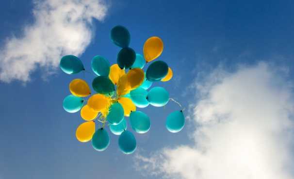 cluster of balloons in the sky